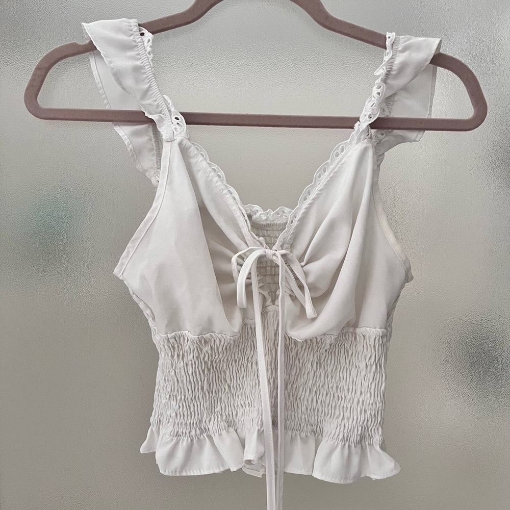 Flowy tie front tank top with lace details
